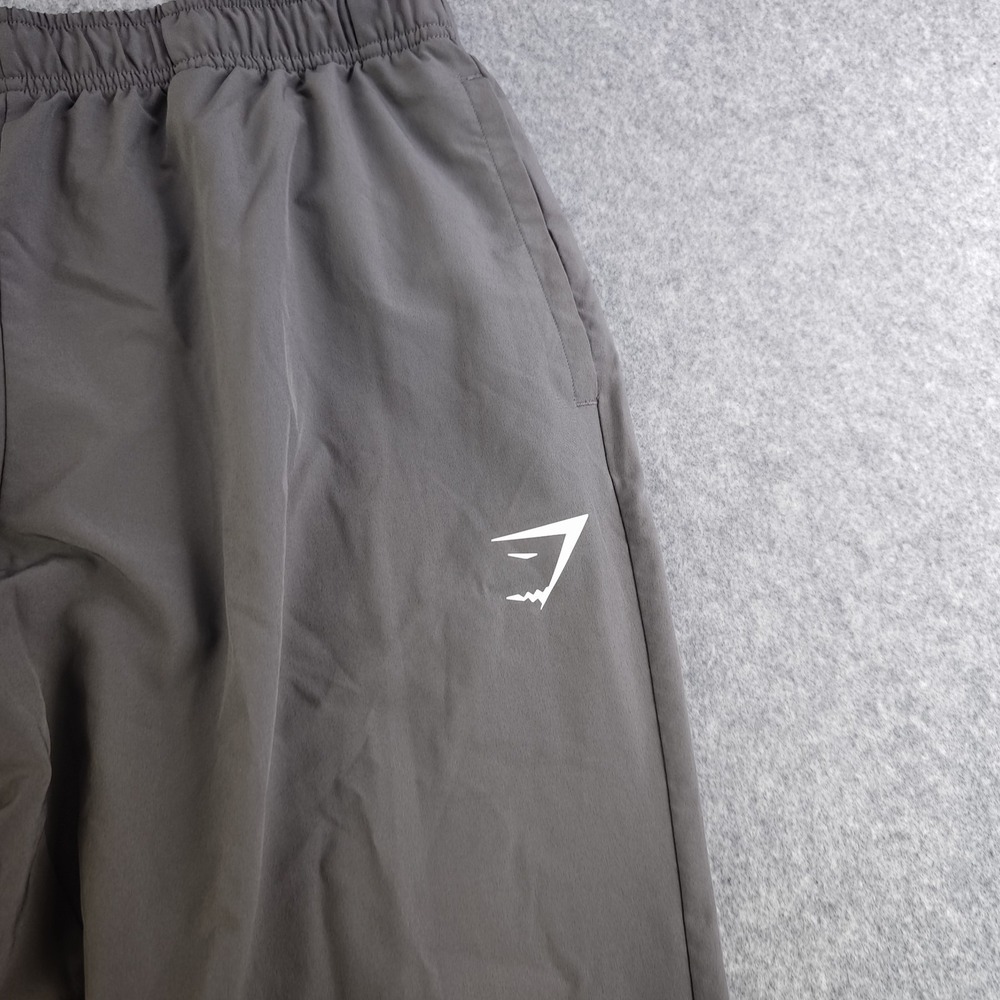 Gymshark Arrival Woven Joggers Mens Medium Silhouette Gray Zip Ankle Slim - Picture 2 of 13